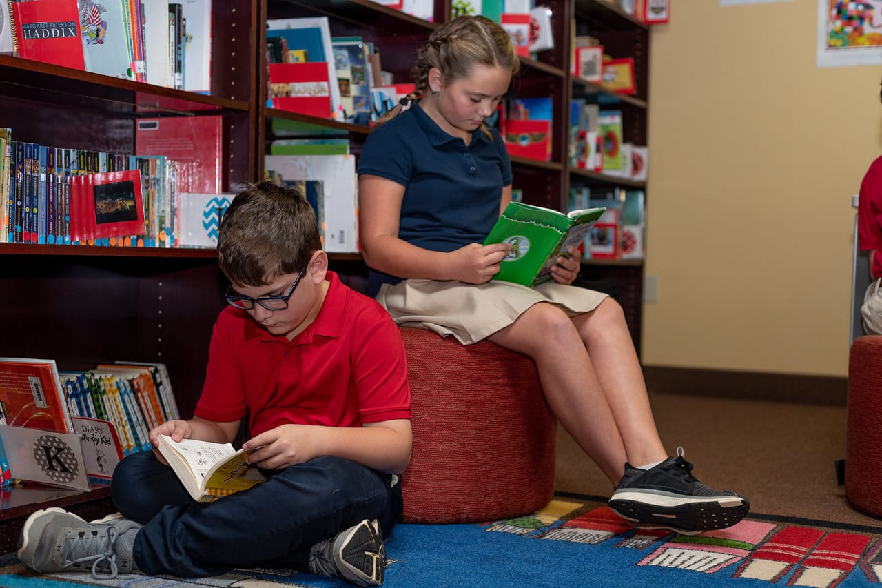 Rossville Christian Academy high school students working together in the library